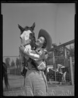 Cowgirl Helen McCord in Tex Austin's cowboy championships, Los Angeles, 1935