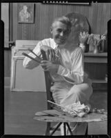 Stanley Reckless seated in the studio of his Silver Lake home, Los Angeles, 1930-1939