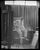 Stanley Reckless seated in the studio of his Silver Lake home, Los Angeles, 1930-1939