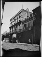 Buildings with a wrought iron balconies in the French Quarter, New Orleans, 1910