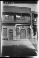 Exterior view of a building on Marchessault Street in old Chinatown, Los Angeles, 1900-1930