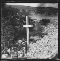 Small cross on hill overlooking coastline, Monterey vicinity, 1900-1930