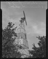 Orchard heater stands on J. E. Bowersmith's ranch, Whittier, 1936