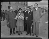 C. D. Hamilton, Mayor Will Fowler, Jessie Reynolds, Harry Hopkins, E. Q. Sullivan, Earl Lee Kelly and an unidentified man at a ribbon cutting ceremony, Redlands, 1936