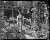 Kimiko Tamura in Toyo Y. Maeda's Japanese garden on North San Pedro Street, Los Angeles, 1935