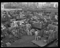 Overhead view of stacked crates at a produce market, Los Angeles, 1936