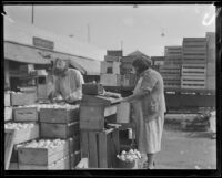 Onion crates at a produce market, Los Angeles, 1936