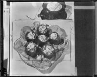 Stuffed peppers resting on a bed of lettuce, 1936