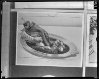 Whole cooked tongue on a platter, 1936