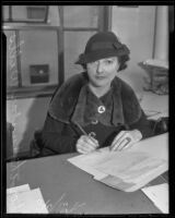 Dorothy Dunbar Wells signing documents, Los Angeles, 1936