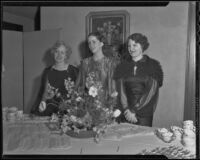 Exa Browning Link, Edna Lavin Cobb, and Georgia McCoy Rose pose before a luncheon table, Los Angeles, 1936