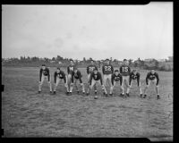 Eleven football players in formation in a practice field, Los Angeles, 1938
