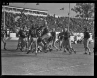 Los Angeles Bulldogs play Cleveland Rams at Gilmore Stadium, Los Angeles, 1938