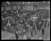 Crowds visit the annual automobile show at Pan-Pacific Auditorium, Los Angeles, 1938