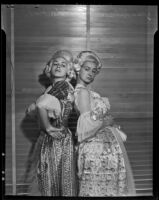 Nancy Knox and Jean Gibson as the stepsisters in the Junior League production of "Cinderella", Los Angeles, 1938