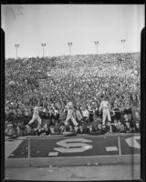 Spectators at the football game between USC and Notre Dame at the Coliseum, Los Angeles, 1938