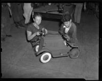 Two unidentified boys repair a toy car, Lafayette, 1938