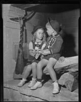 Lynn Helm and Lawrence Opsahl model children’s winter fashion, Los Angeles, 1938