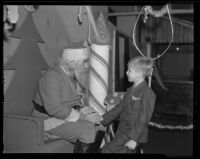 Boy meets Santa Claus, Los Angeles vicinity, 1938