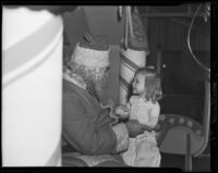 Small girl visits Santa Claus, Los Angeles (vicinity), 1938