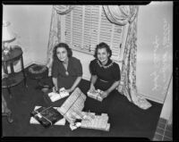 Winifred Dutton and Judy Elliott wrap presents, Los Angeles, 1938
