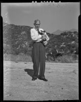 Mr. Fred Anthony Lovell, centenarian, with his dog, Los Angeles, 1938