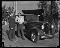 E. B. Hollister, Los Angeles Times city circulation manager, and chauffeur Harry Mac Adams, Los Angeles, 1935-1939