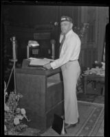 Warren Atherton, Commander of the American Legion, standing at a podium, California, 1930s
