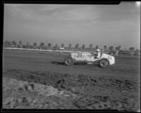 Stock car and driver at Mines Field, Los Angeles, 1934
