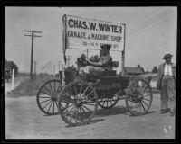 Automobile dating to 1898, used to advertise Charles W. Winter Garage, Los Angeles, 1920-1939