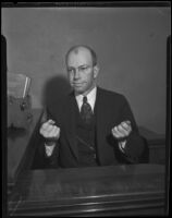 Reverend Glenn Randall Phillips, perhaps in a witness box in Superior Court, Los Angeles, 1928
