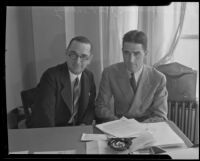 Donald Renshaw and James Pinkney of the National Recovery Adm., in  the N.R.A. office at the Chamber of Commerce Building, Los Angeles, 1934