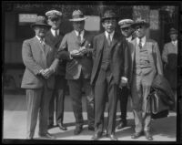 Theodore Douglas Robinson, Assistant Secretary of the Navy, greeted at a train station, Los Angeles, 1925