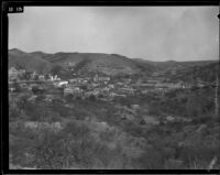 Landscape surrounding an unidentified town surrounded by hills, likely in southern Arizona, 1934