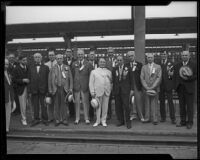 Governors James Rolph, Paul V. McNutt, George White, C. Ben Ross, Theodore F. Green, Guy B. Park, F. H. Cooney, Wilbur L. Cross, John G. Winant, Ibra C. Blackwood, and George H. Dern gather with William Stephens at the train station, Los Angeles, 1933