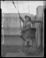 Sigurd Russell poses on rigging, [Los Angeles vicinity?], 1929