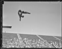 Farid Simaika, 1928 Olympic diver, in a pike position during the flight of a dive, between 1928-1939