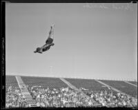 Farid Simaika, Olympic diver, in straight position during the flight of a dive, between 1928-1939