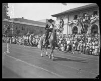 Sam J. Stanwood rides a horse in the Old Spanish Days Fiesta parade, Santa Barbara, 1930