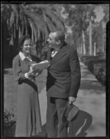 At a meeting of the California Writers' Guild, Horatio Winslow, author, explains a script to Ruth Jenkins, Claremont, 1935