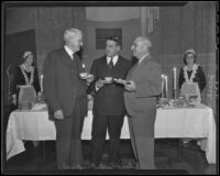 Harry Chandler, Gordon B. Kaufman, and Jacob Baum at tea in the Times Building auditorium, Los Angeles, 1935