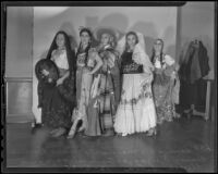 Performers pose in costume at the Los Angeles Times 