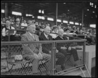 Oscar Reichow, Dave Fleming, and Bill Klepper watch a baseball game at Wrigley Field, Los Angeles, 1934