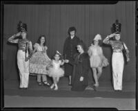 Children rehearsing for a Christmas play assisted by society women, Los Angeles, 1935