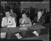 Attorney Arthur Verge with clients Frank Sebastian and Walter Pollock in court, Los Angeles, 1935