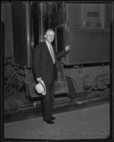 Reverend Dr. E. C. McGown at a train station, Los Angeles (probably), 1935