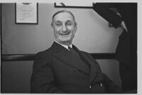W. G. McAdoo seated at his desk, circa 1933-1938