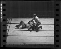 Wrestling match between Joseph “Jumping Joe” Savoldi and Mayes McLain, Olympic Auditorium, Los Angeles, 1935