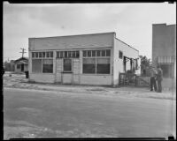 Exterior of the storefront hideout of Leroy Anderson, who attempted to kidnap banker Herbert D. Ivey, Los Angeles, 1935