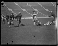 Football game between the Los Angeles Firemen and the Olympic Club at the Coliseum, 1931